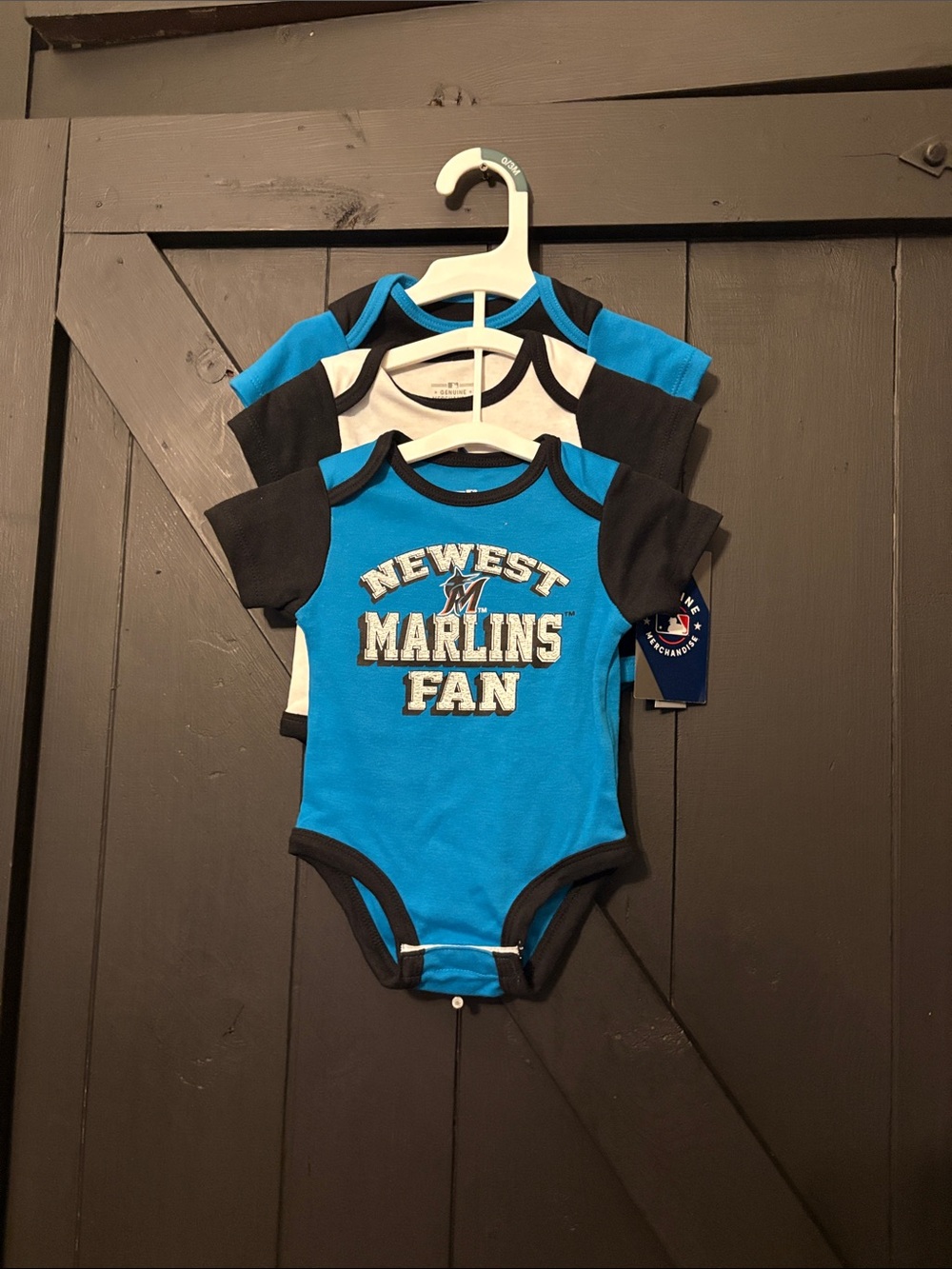 Genuine Merchandise Marlins Newest Fan Blue & Black Baby One-Piece Bodysuit